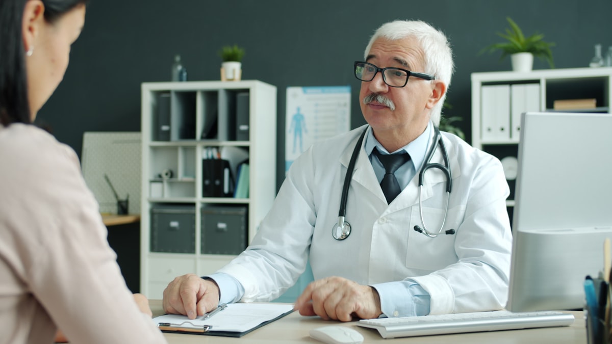 Doctor consulting with patient in a modern medical office