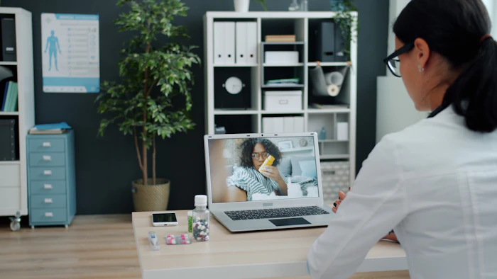 Asian fertility specialist consulting with a patient