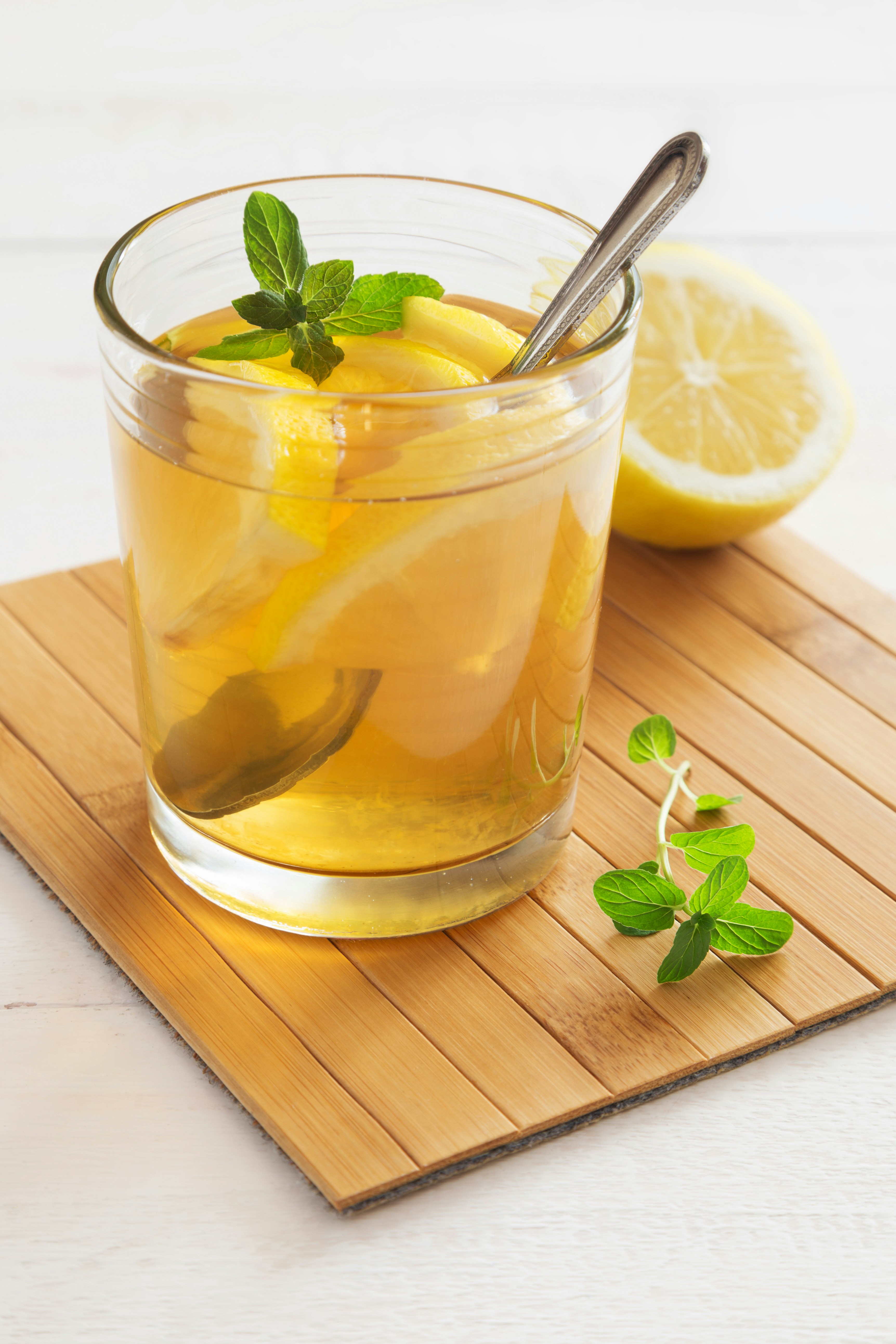 Glass of iced tea with lemon and mint