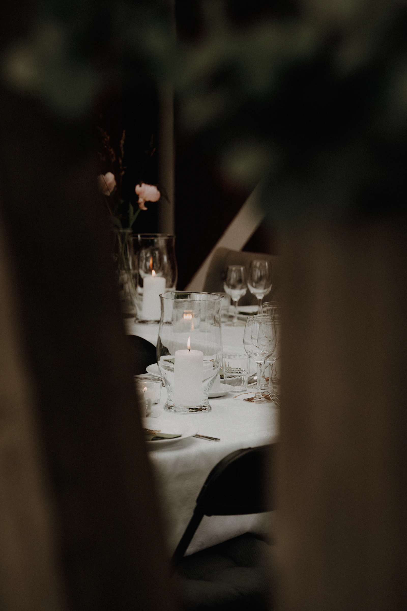 Table setting with candles and glassware
