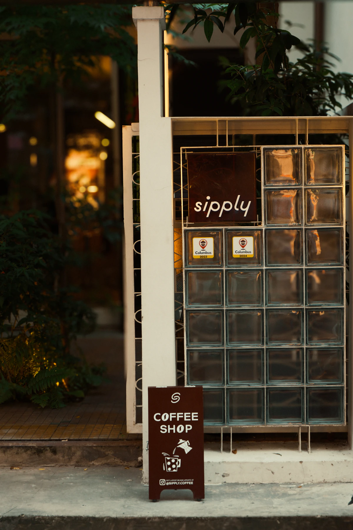 Coffee shop sign outside the building
