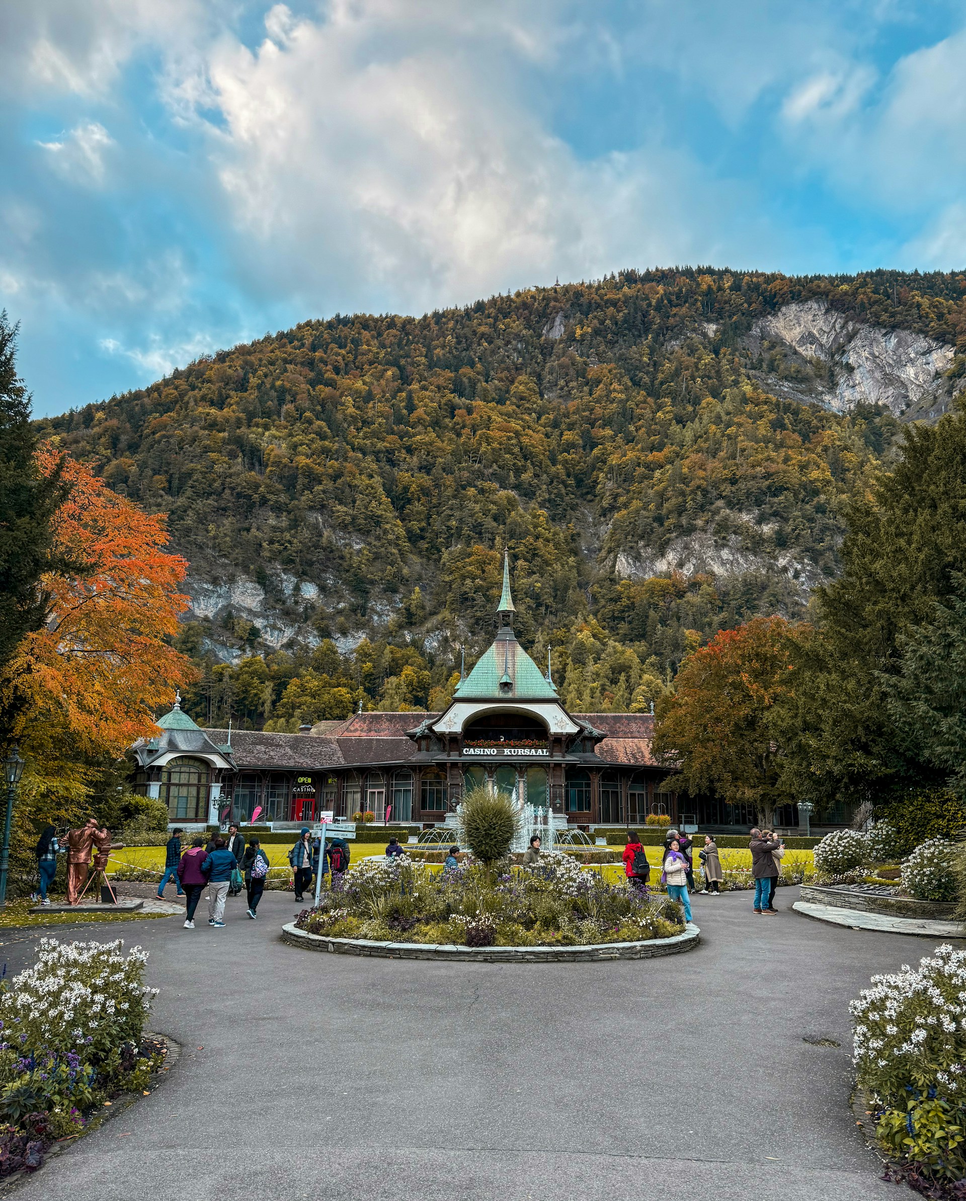 Historic building nestled at the foot of a mountain.
