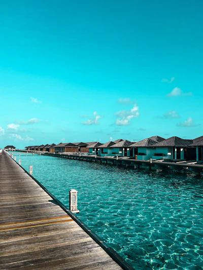 Overwater bungalows on a turquoise lagoon