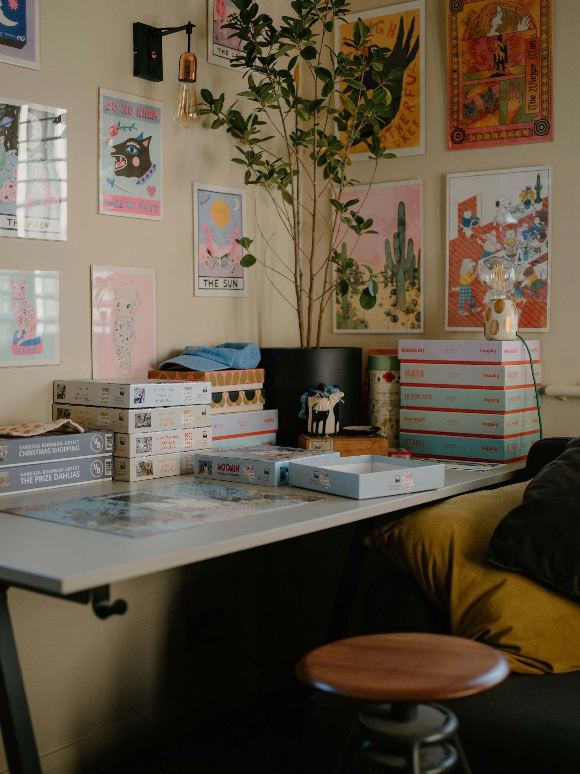 Desk with puzzles and colorful wall art