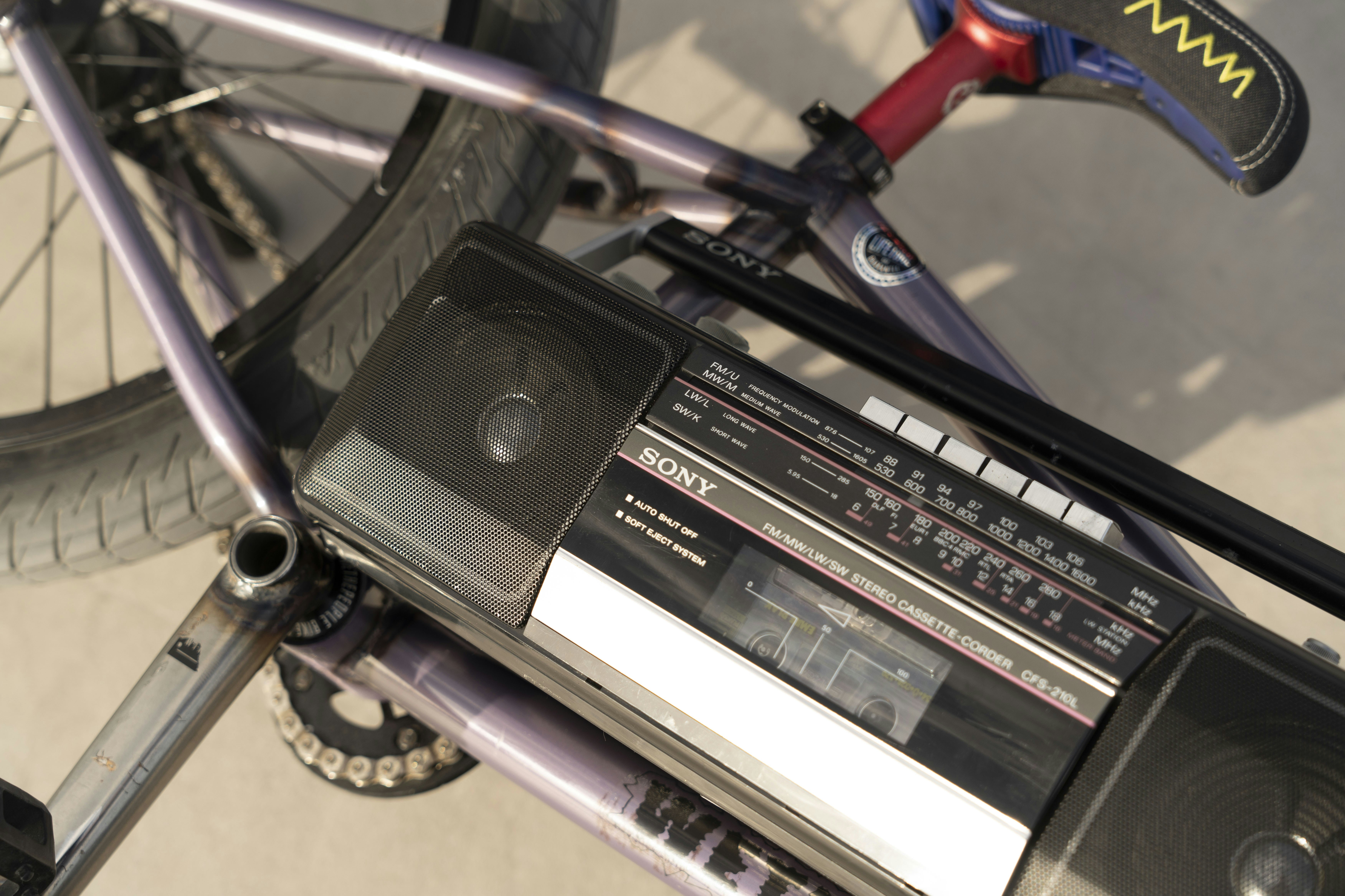 Boombox on a purple bicycle frame