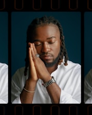 Man with eyes closed resting head on hands