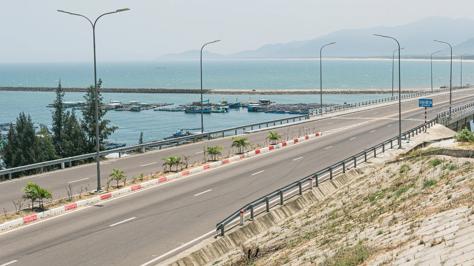 Coastal highway with the ocean and distant mountains