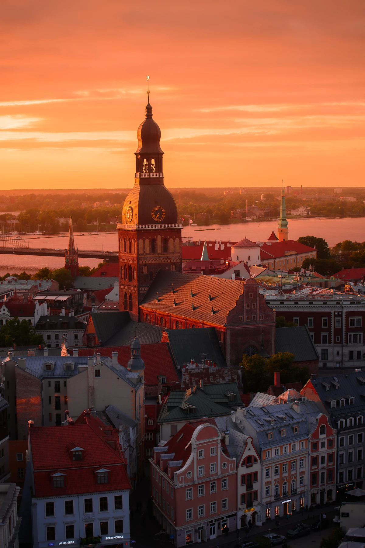 Sunset over a historic European city skyline