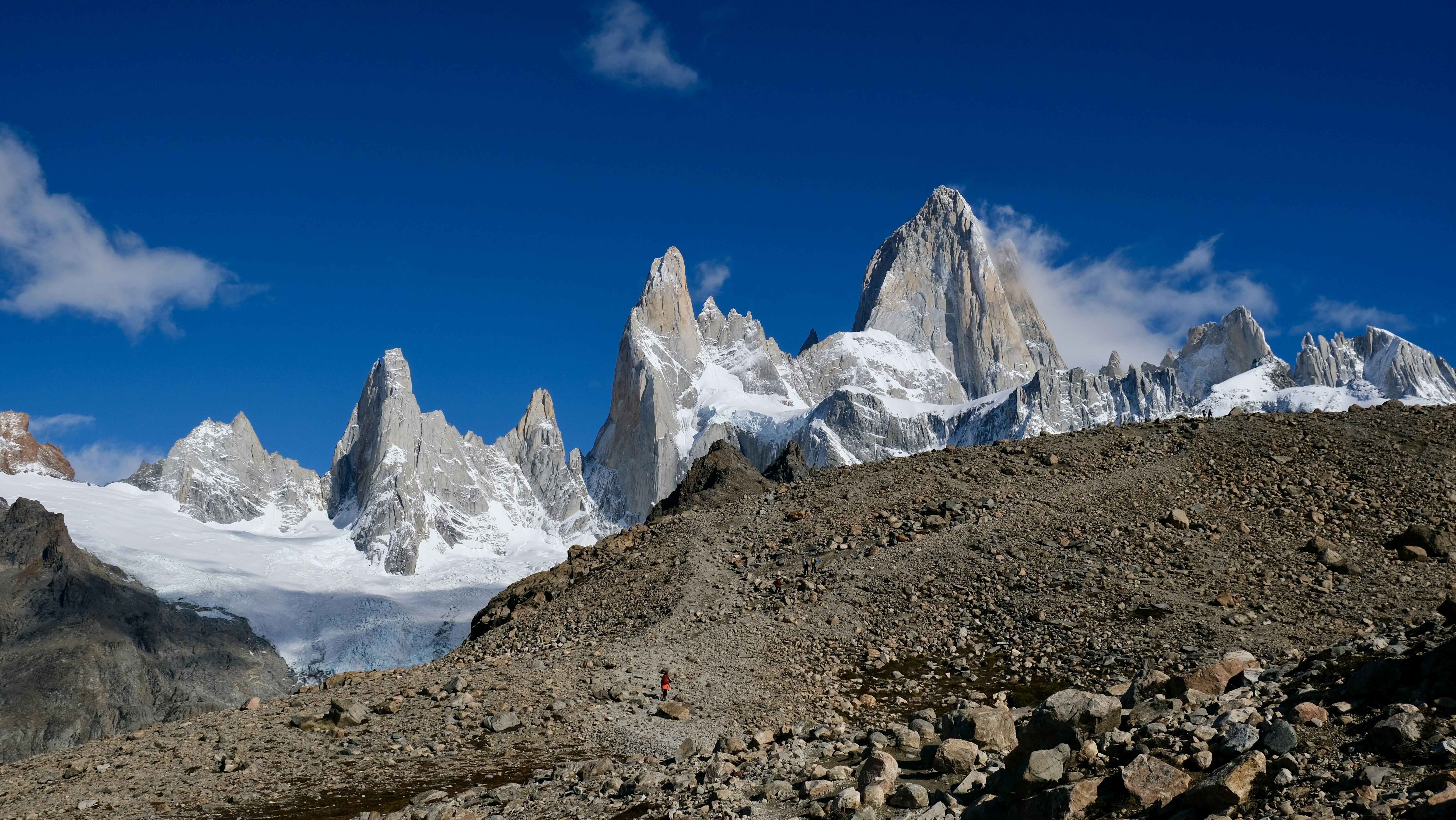 Jagged mountain peaks under a clear blue sky.