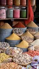 Colorful spices and dried goods displayed in market