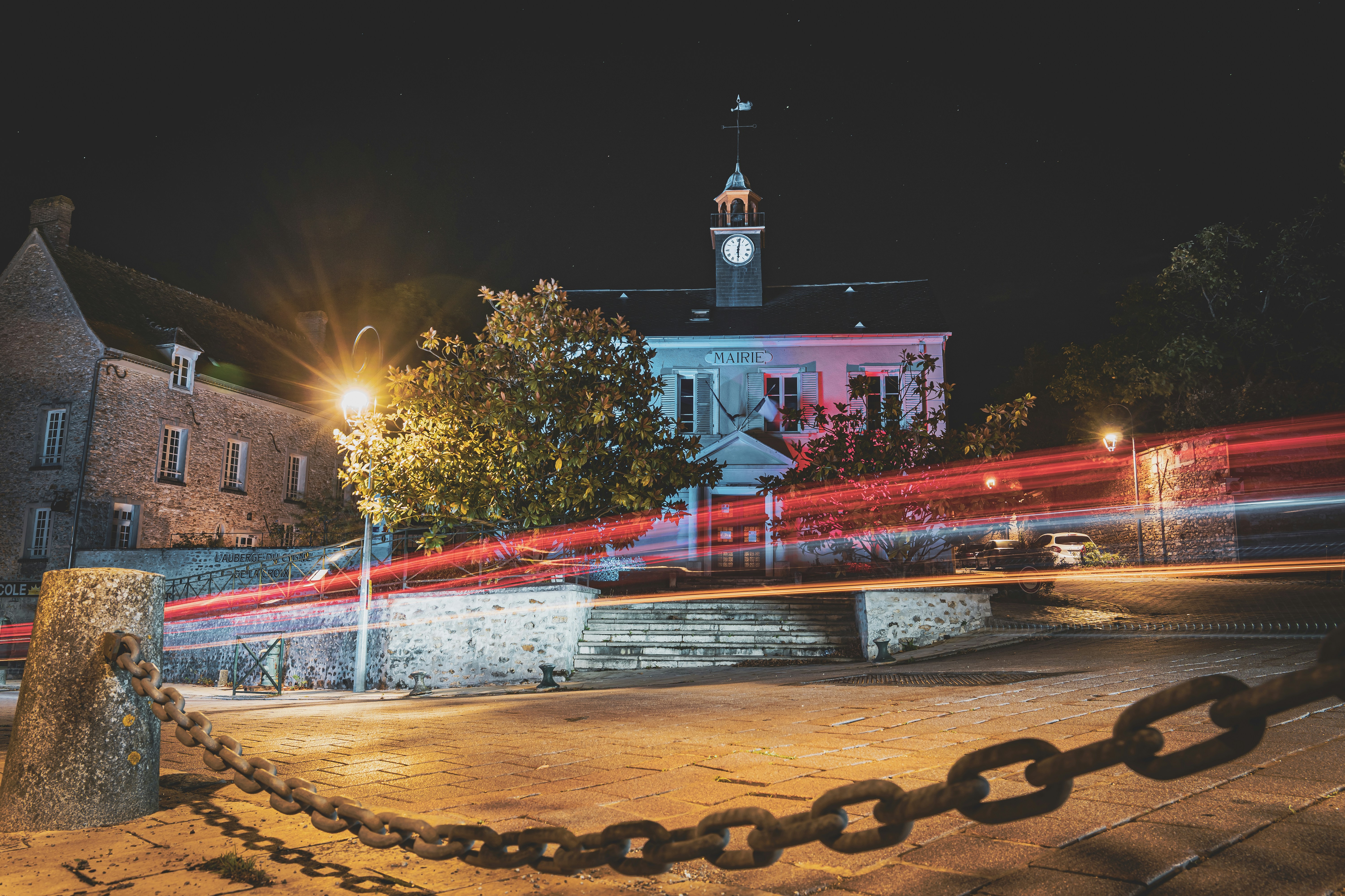 Building with light trails at night