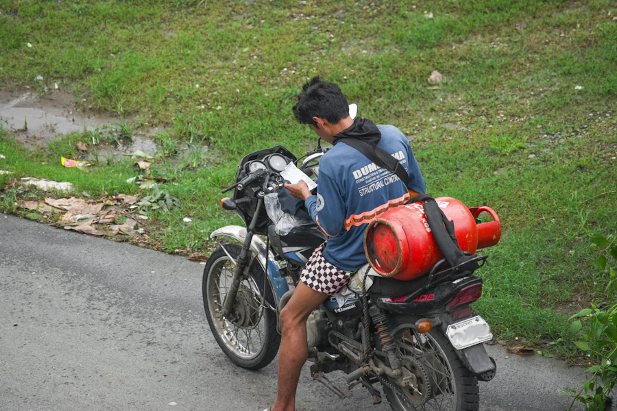 Gas cylinder being delivered by motorcycle