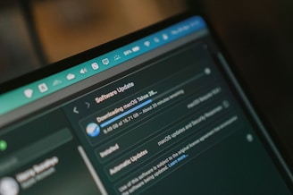 Macbook screen shows macos software update downloading
