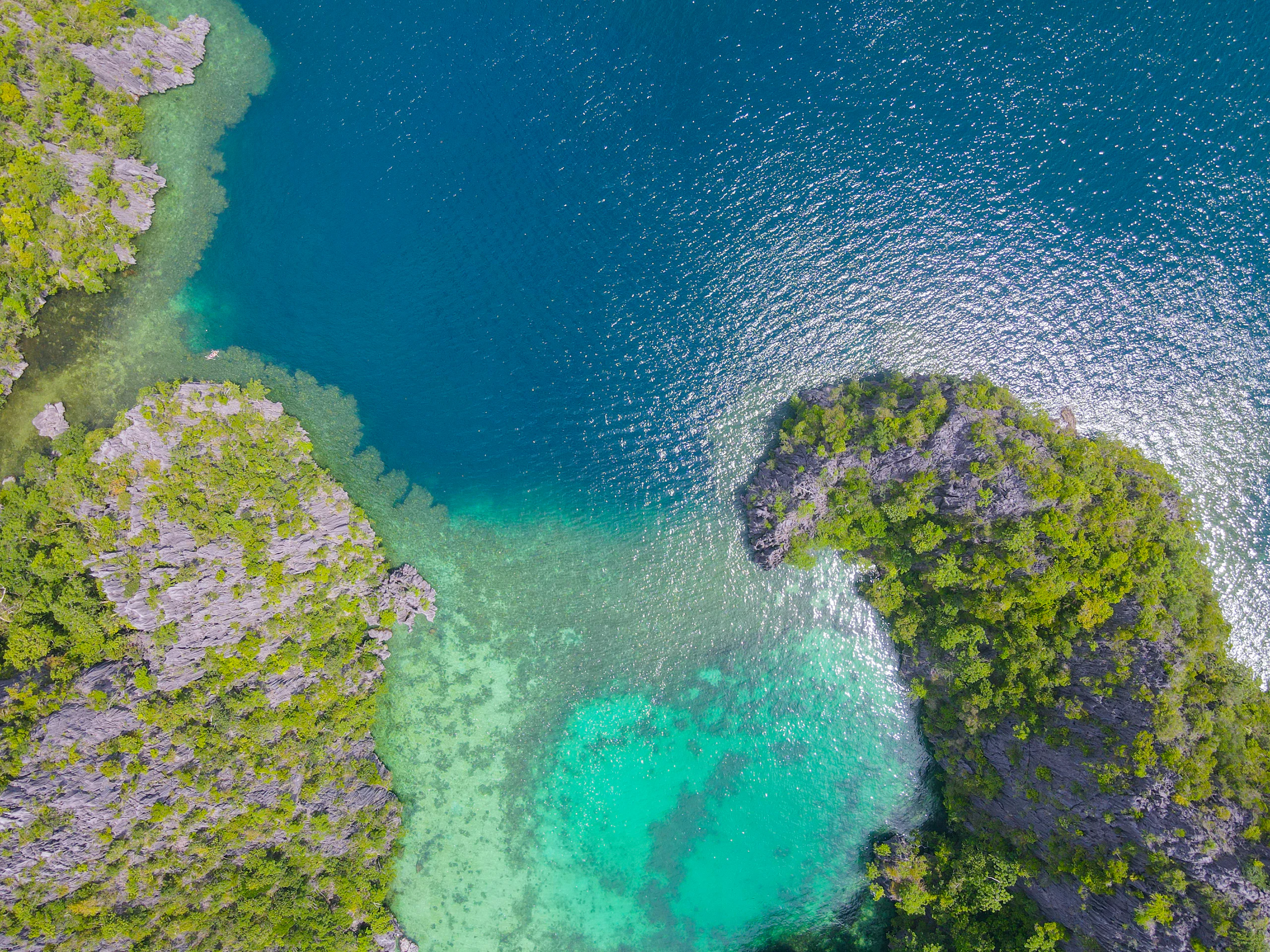 Aerial view of tropical islands and clear turquoise water