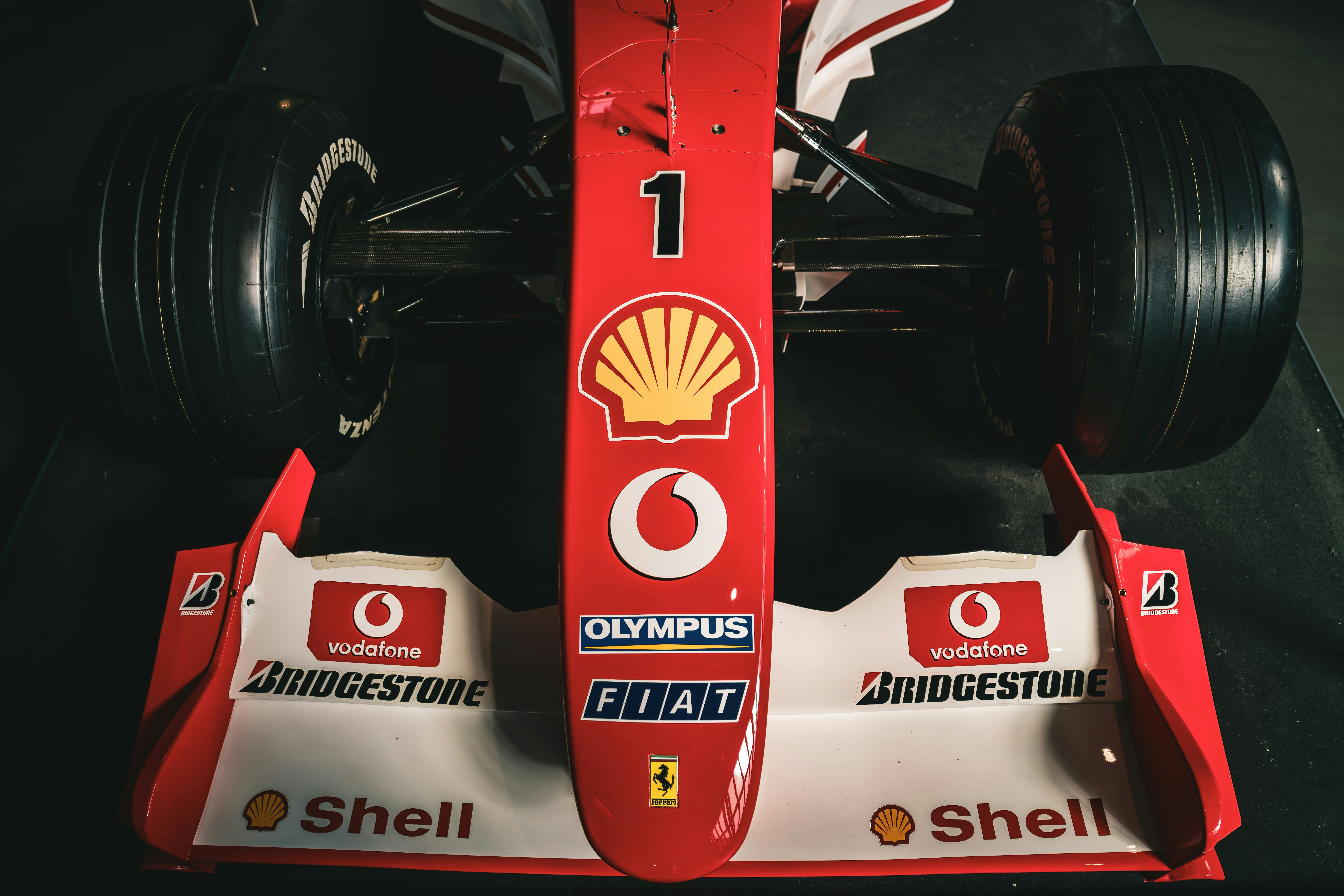 Red race car with number one on front.