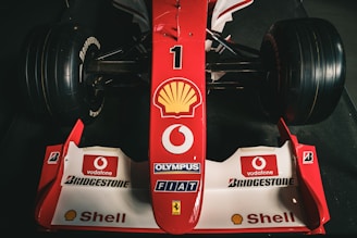 Red race car with number one on front.
