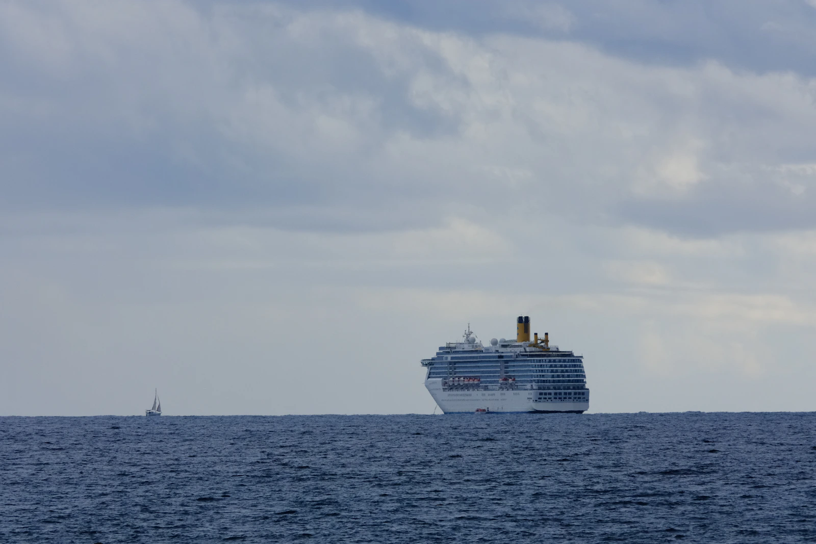 Illustrative image of a cruise ship at sea under cloudy skies, not the M/V Hondius