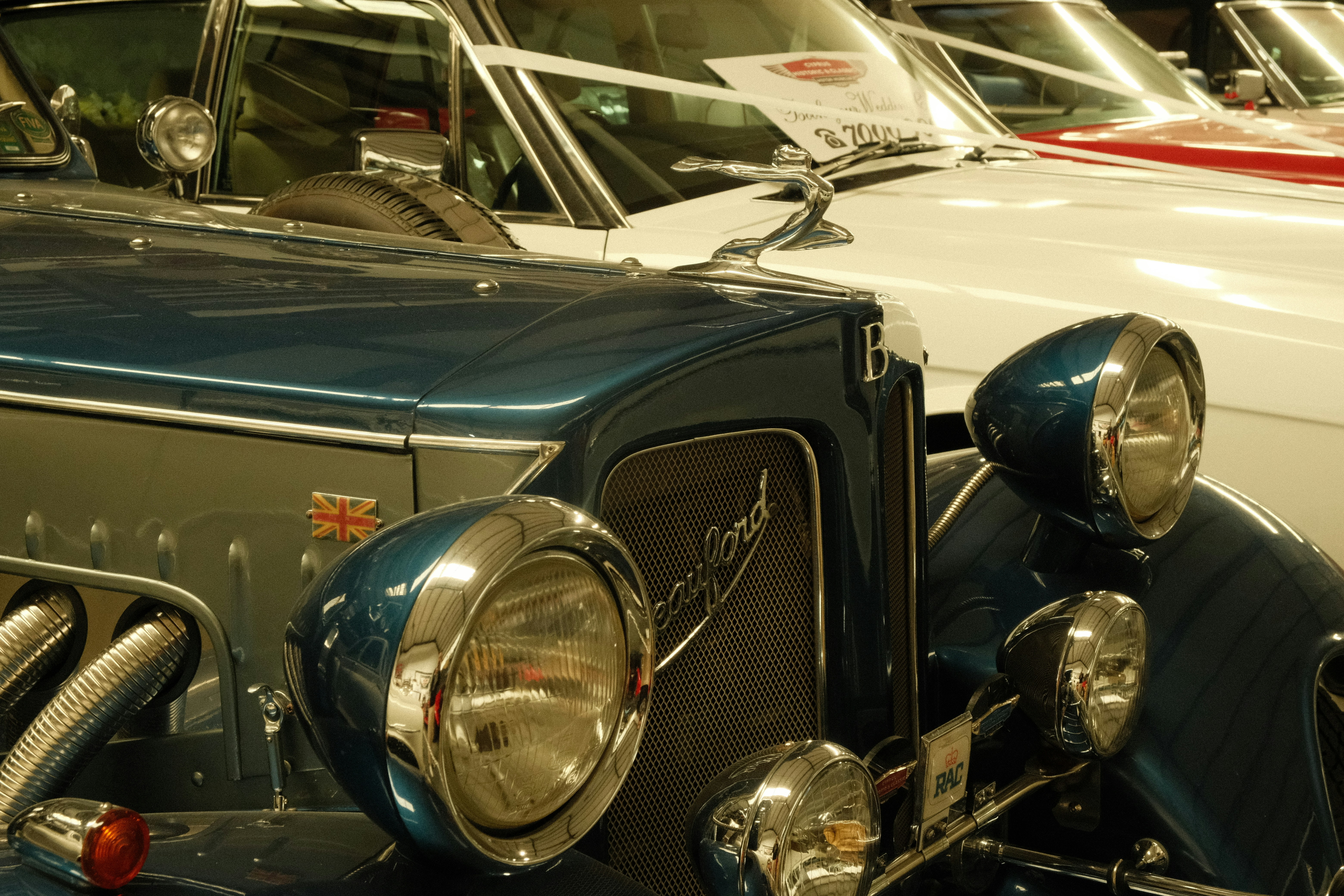 Vintage blue and white cars close-up