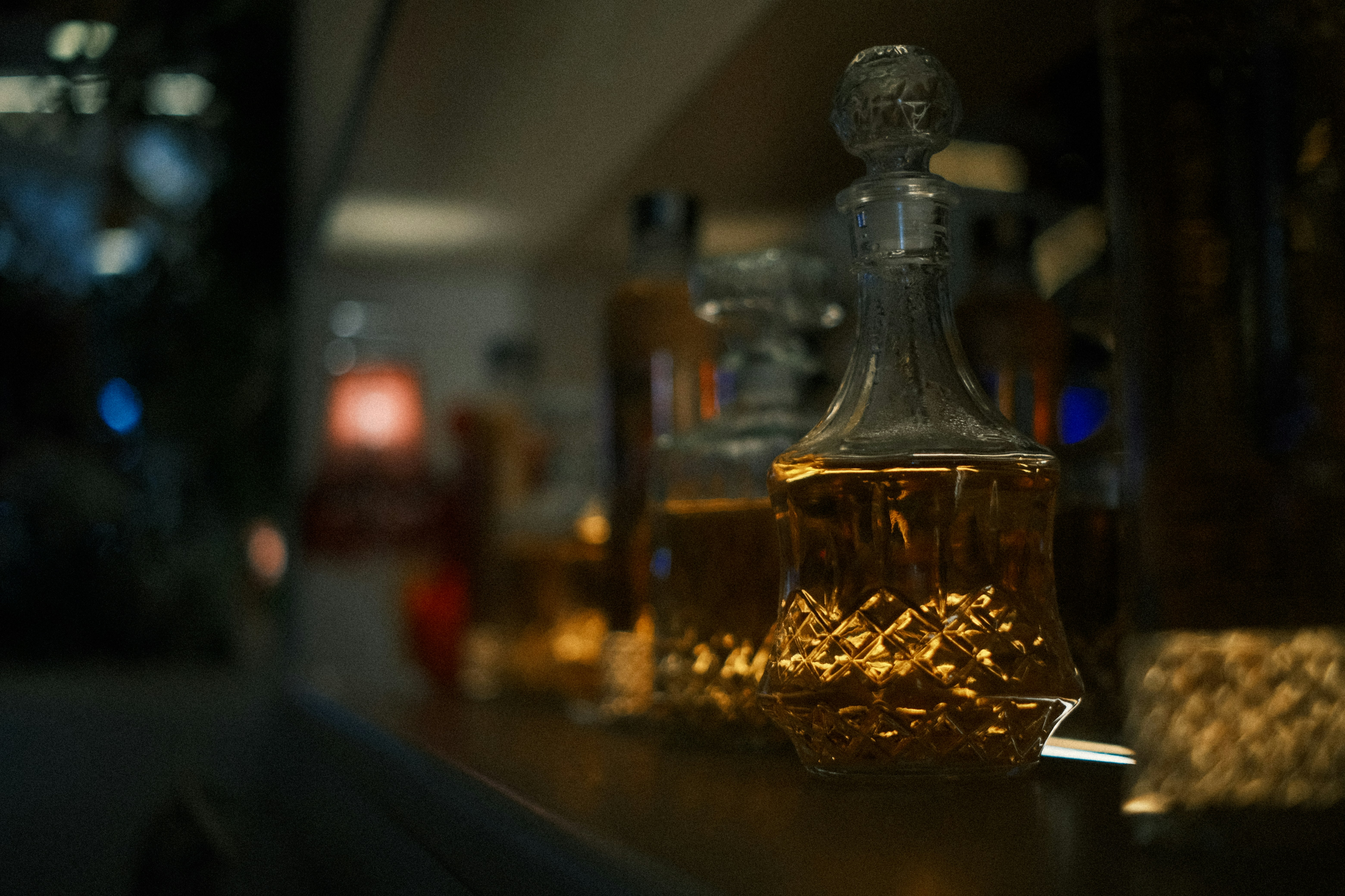 Glass decanters with amber liquid