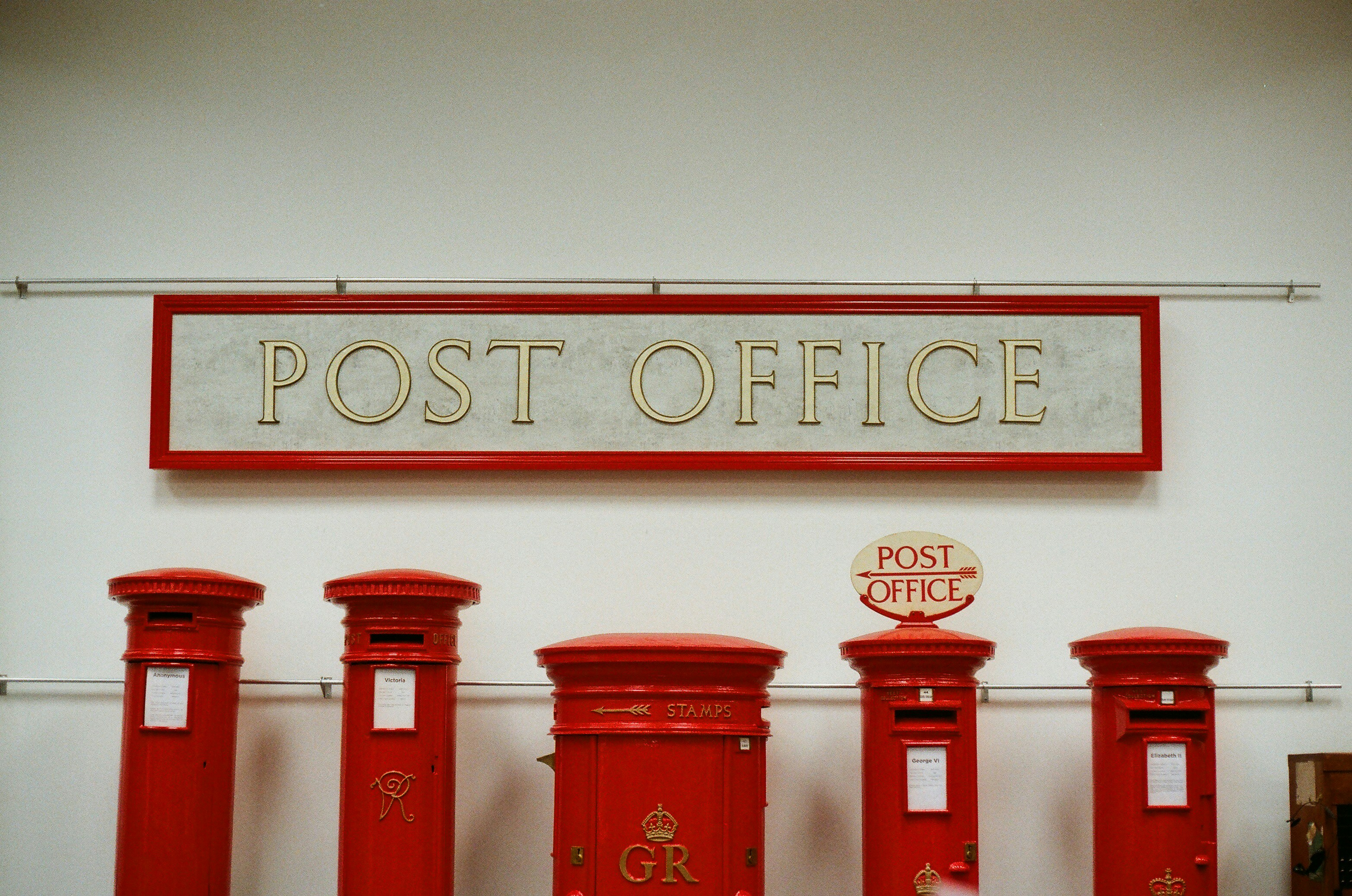 Transport logistics office with red post boxes