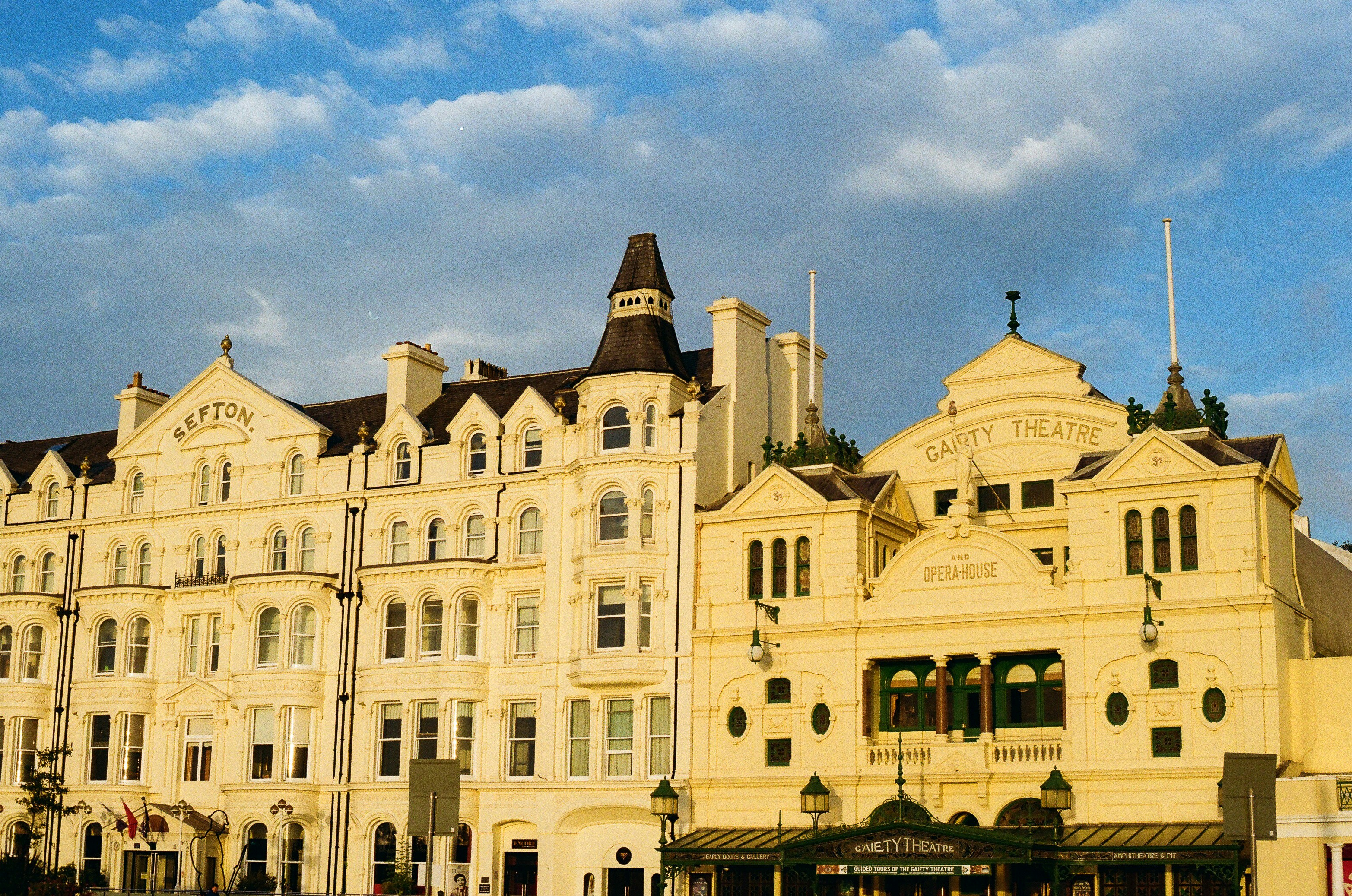 Grand ornate buildings under a cloudy sky