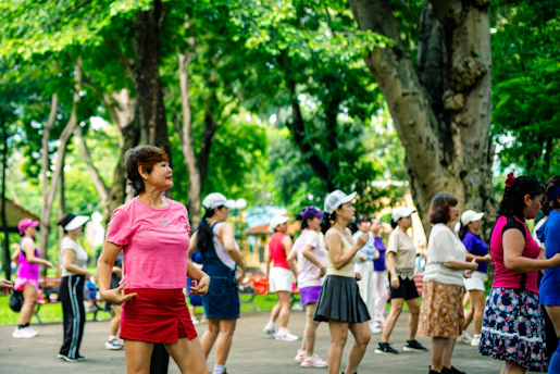 Group of women exercising together in a park
