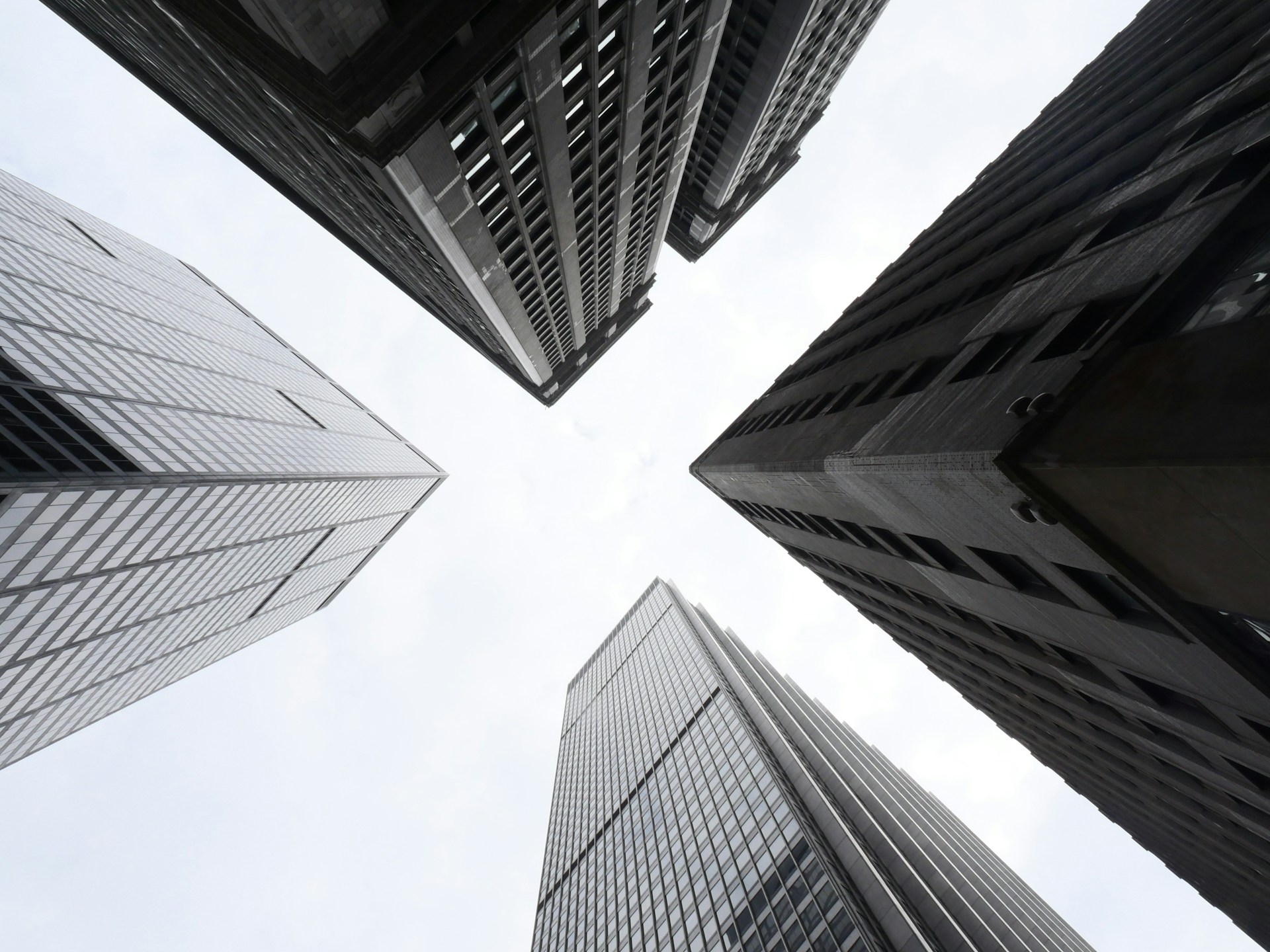 Four tall buildings viewed from below