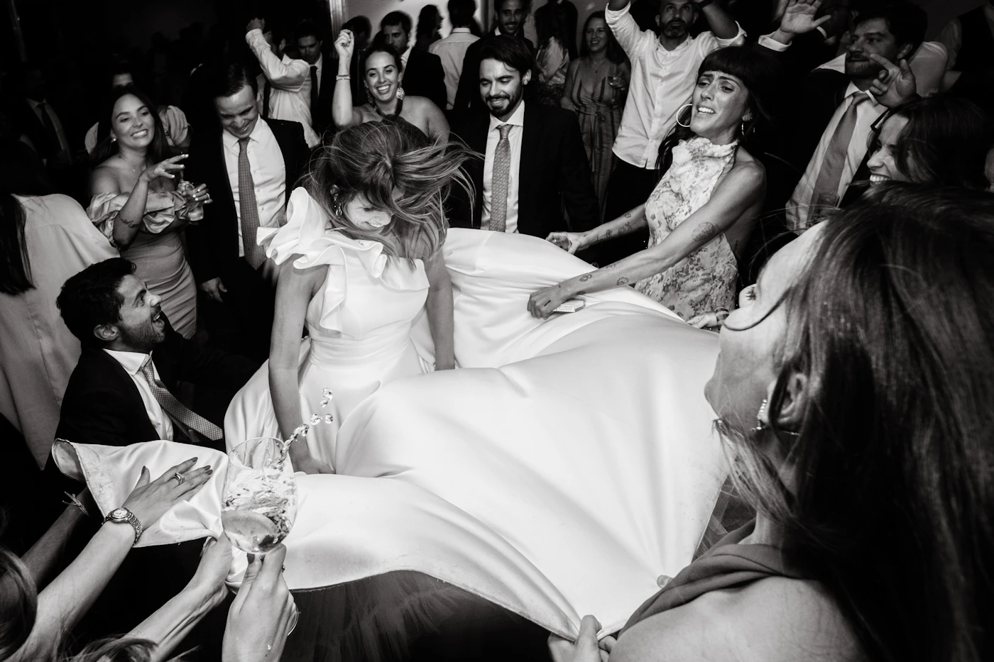 Best Spotify playlists for DIY wedding receptions — Guests dancing at a DIY wedding reception with a curated Spotify playlist.