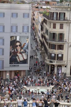 Luxury shopping street scene with designer storefronts and fashion advertising, illustrating luxury.