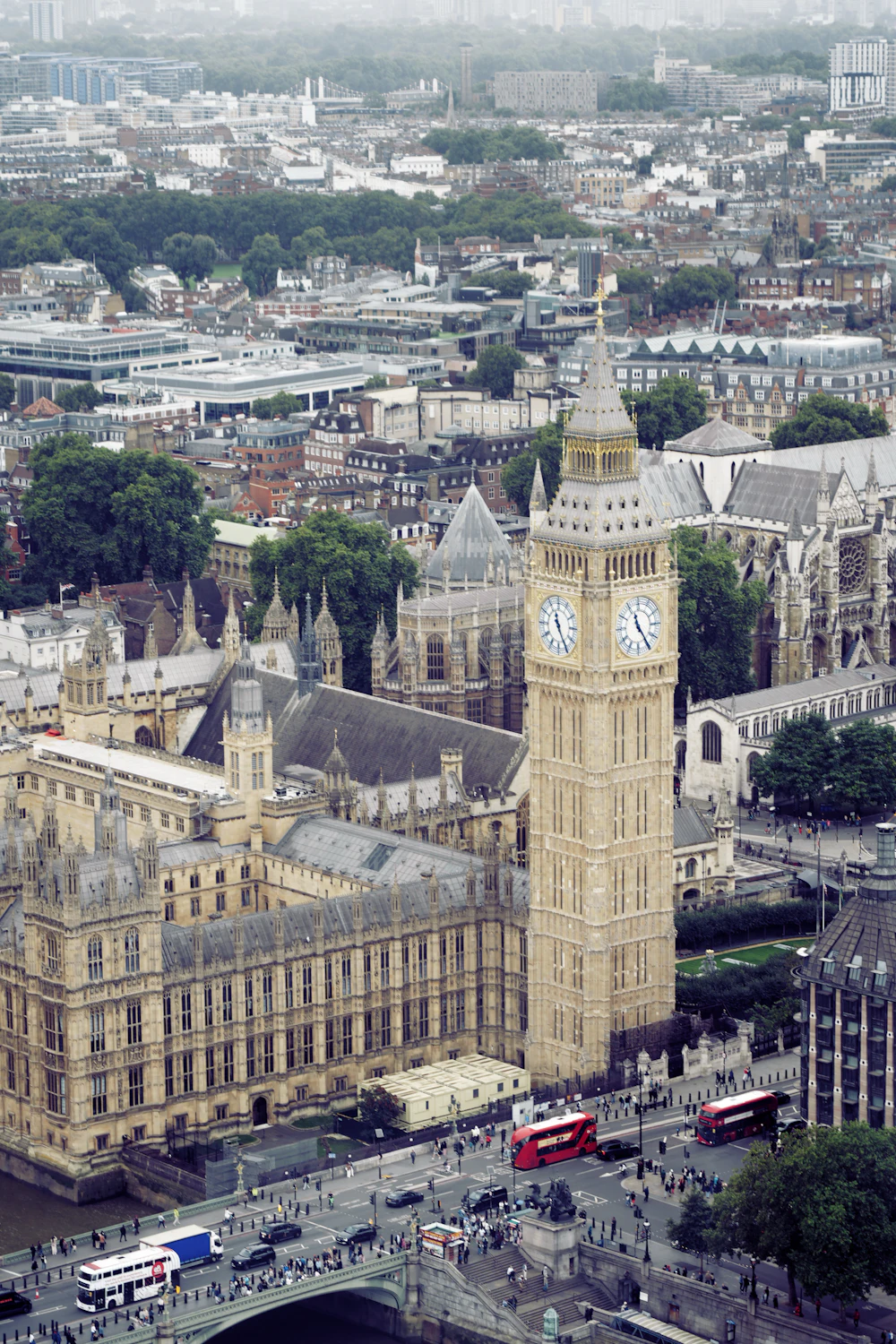 Big Ben, the Houses of Parliament and red double-decker buses in London