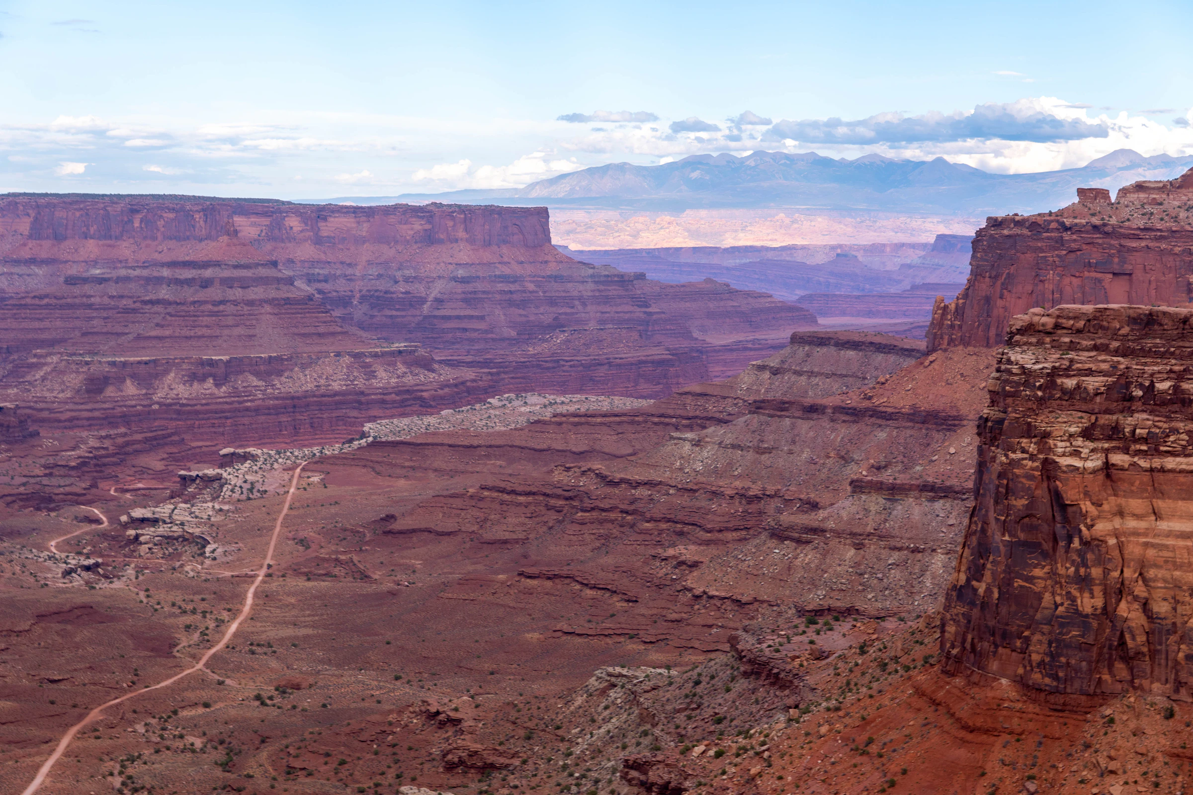 Red rock canyon landscape with distant mountains west of Las Vegas