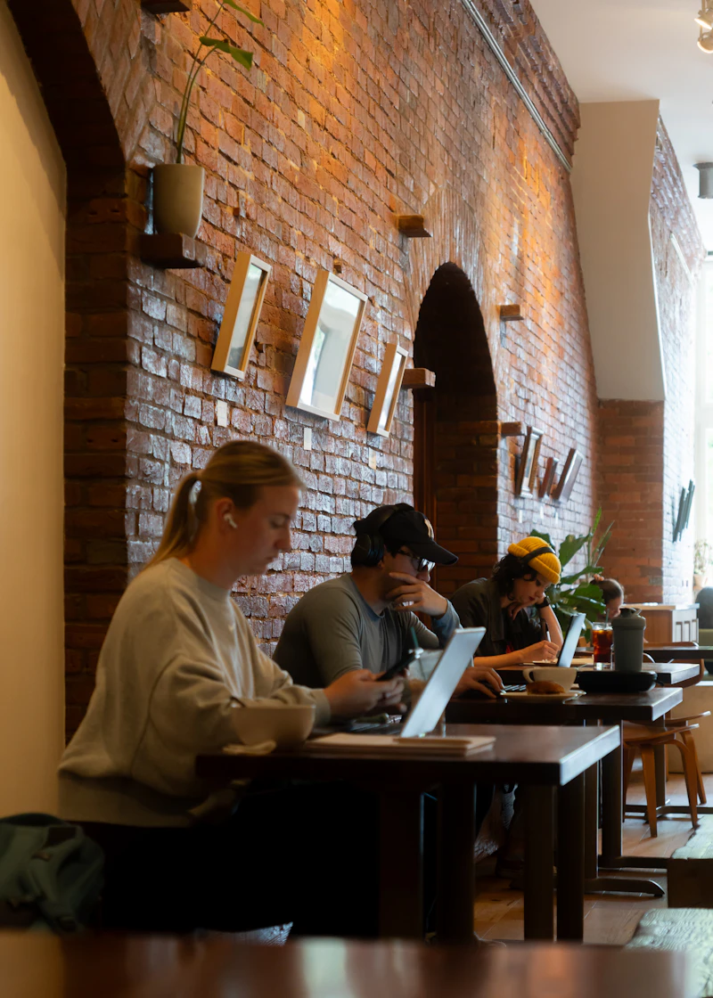 People working together in a cafe