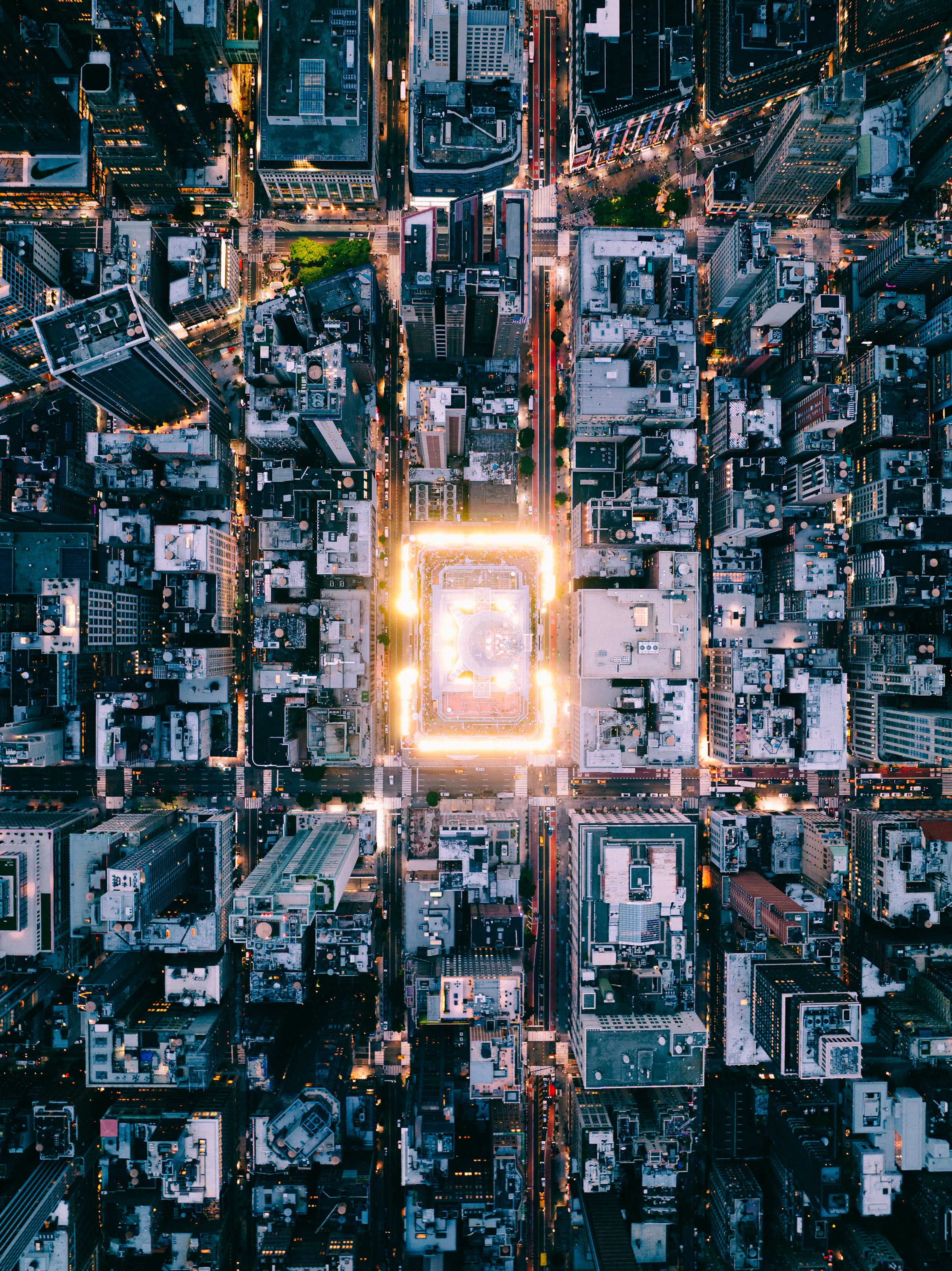 Aerial view of a city skyline at dusk
