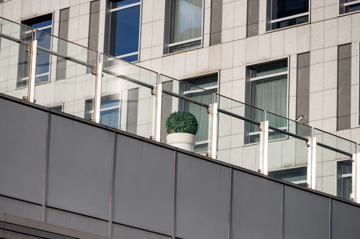 Building facade with glass balcony railings