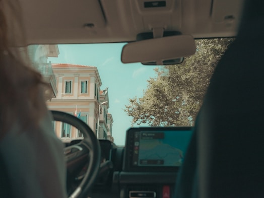 Driving through european city with historic buildings