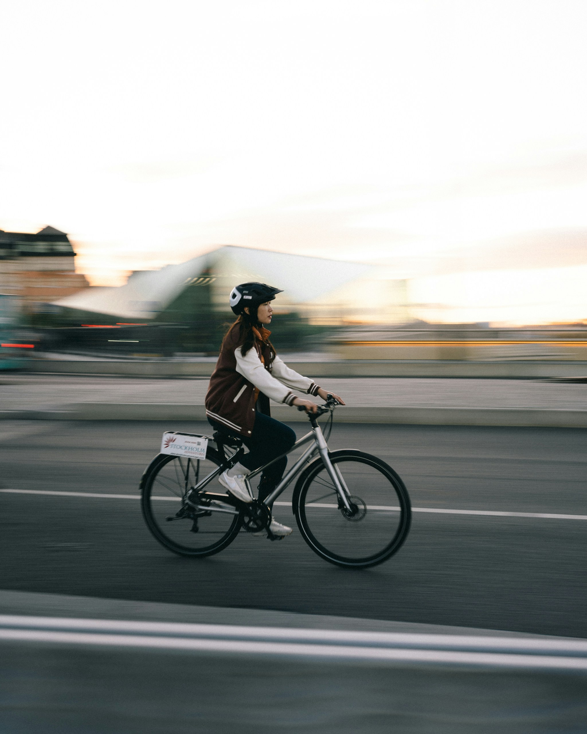 Woman riding a bicycle on a road