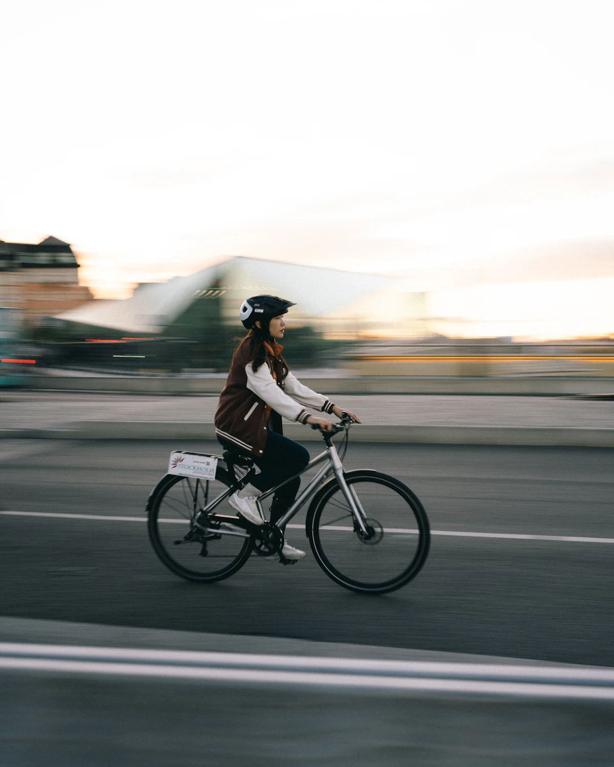 Woman riding a bicycle on a road