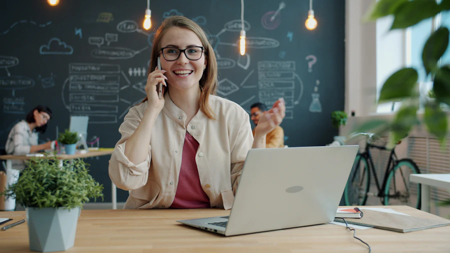 Smiling team member on the phone in the office