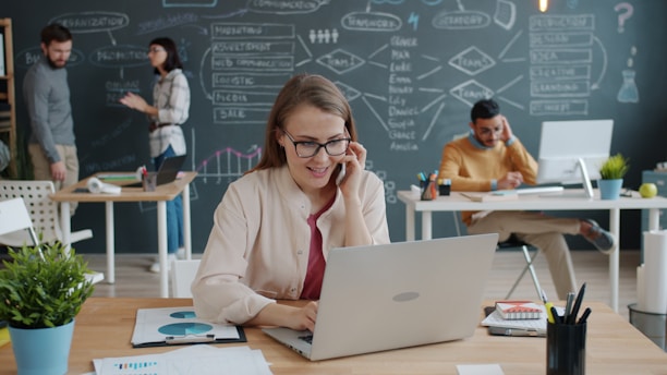 Business professionals working in a modern office environment.