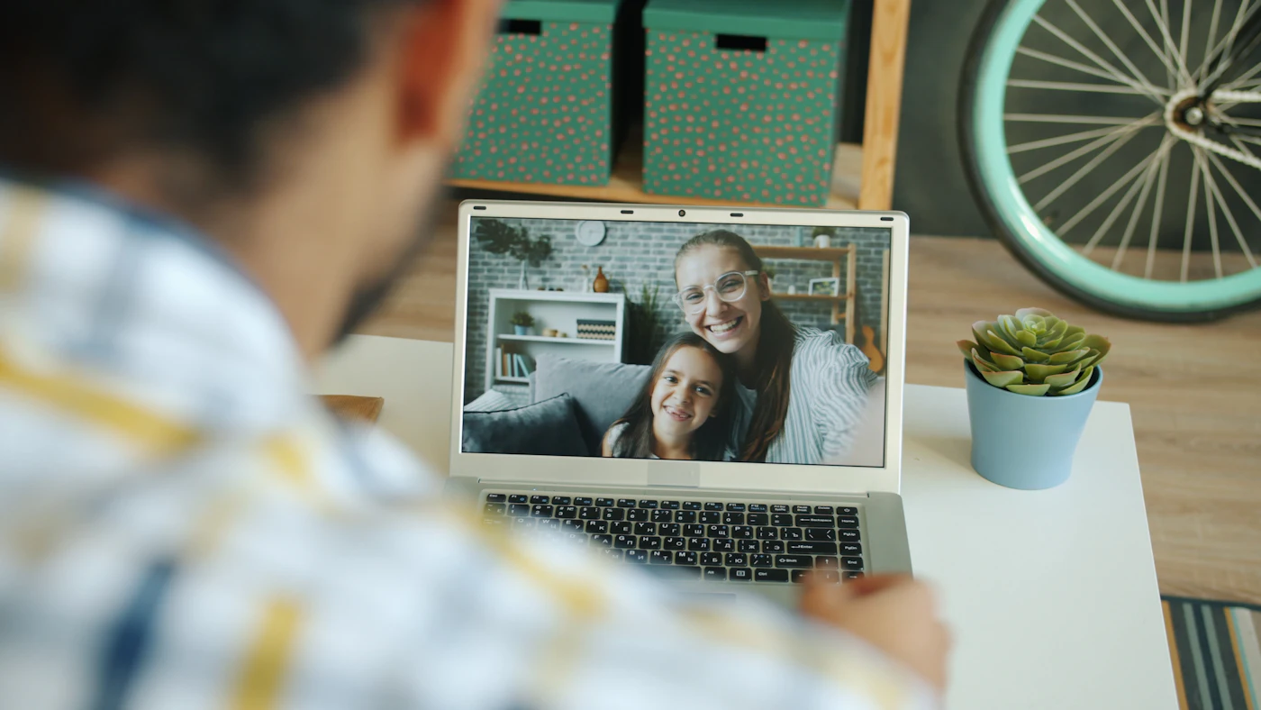 A family at home, connected over a video call