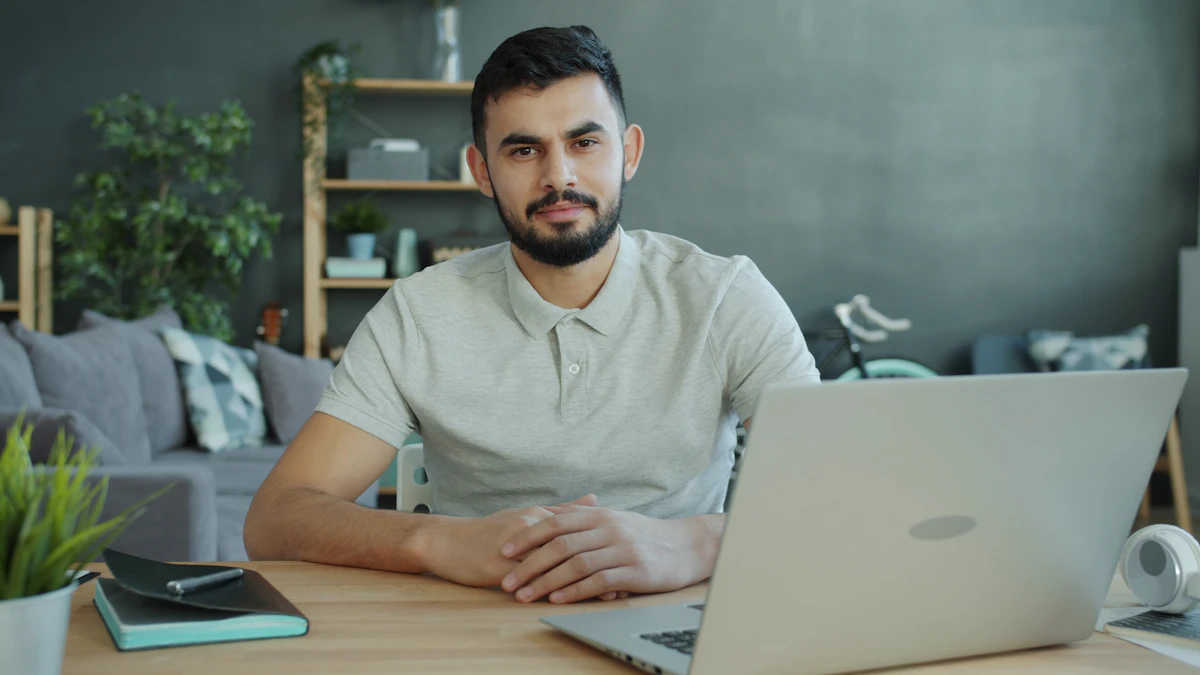 Small business owner working at a desk with a laptop to generate leads