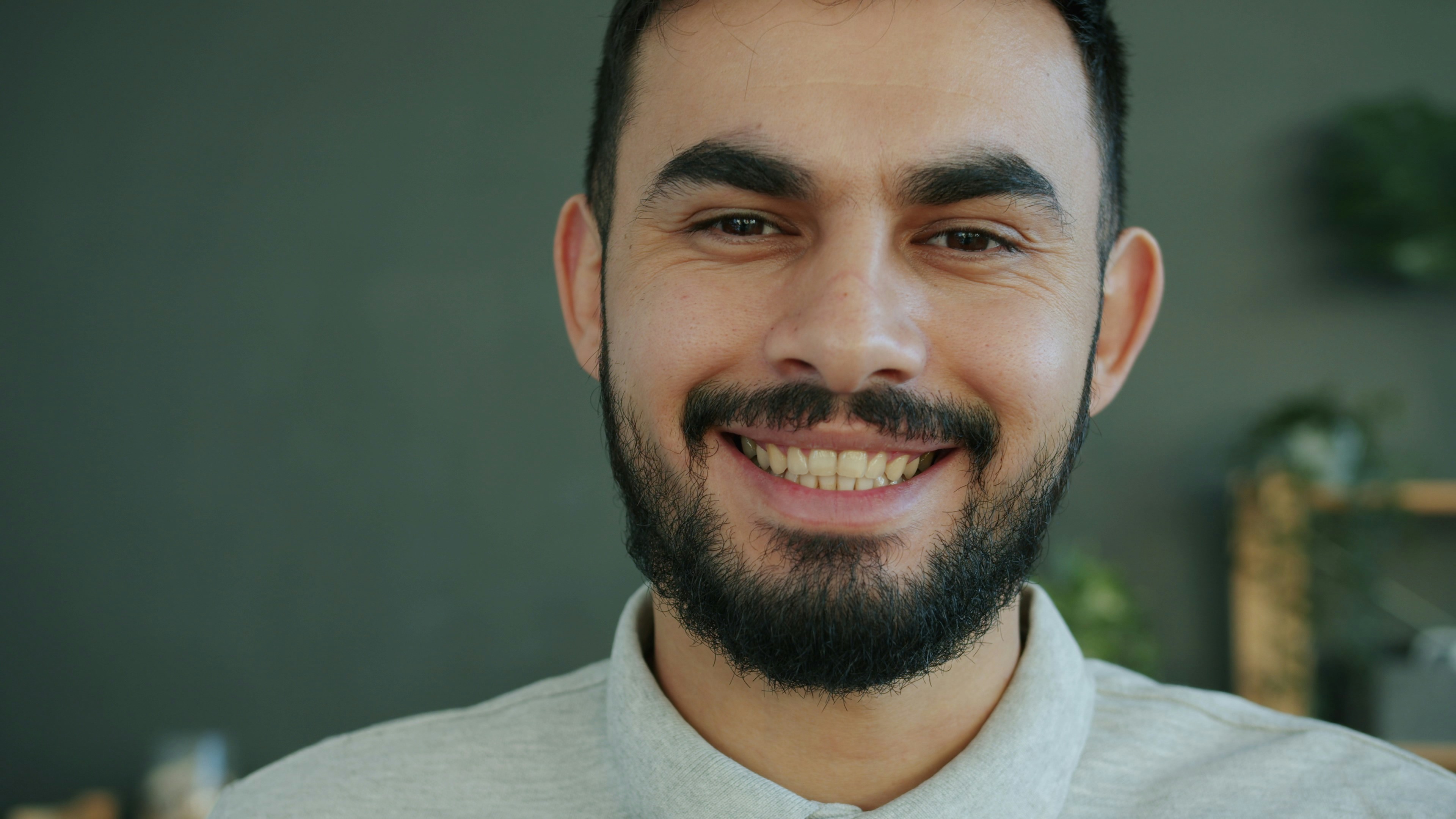 Bearded Arab man smiling
