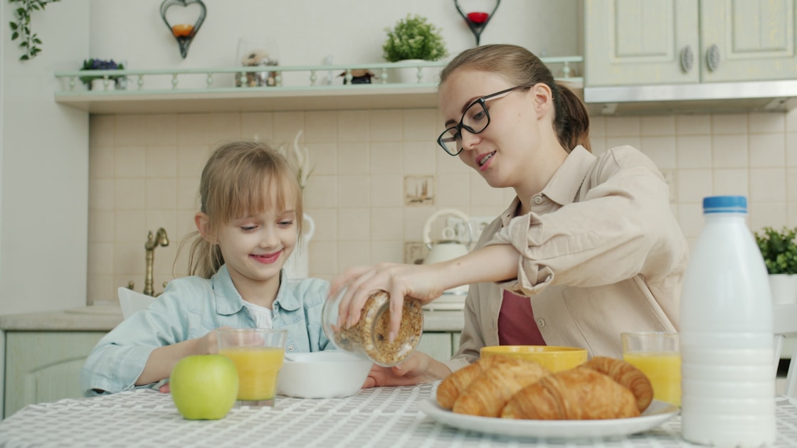 Parent and child enjoying calm breakfast routine - ADHD family routine Sydney