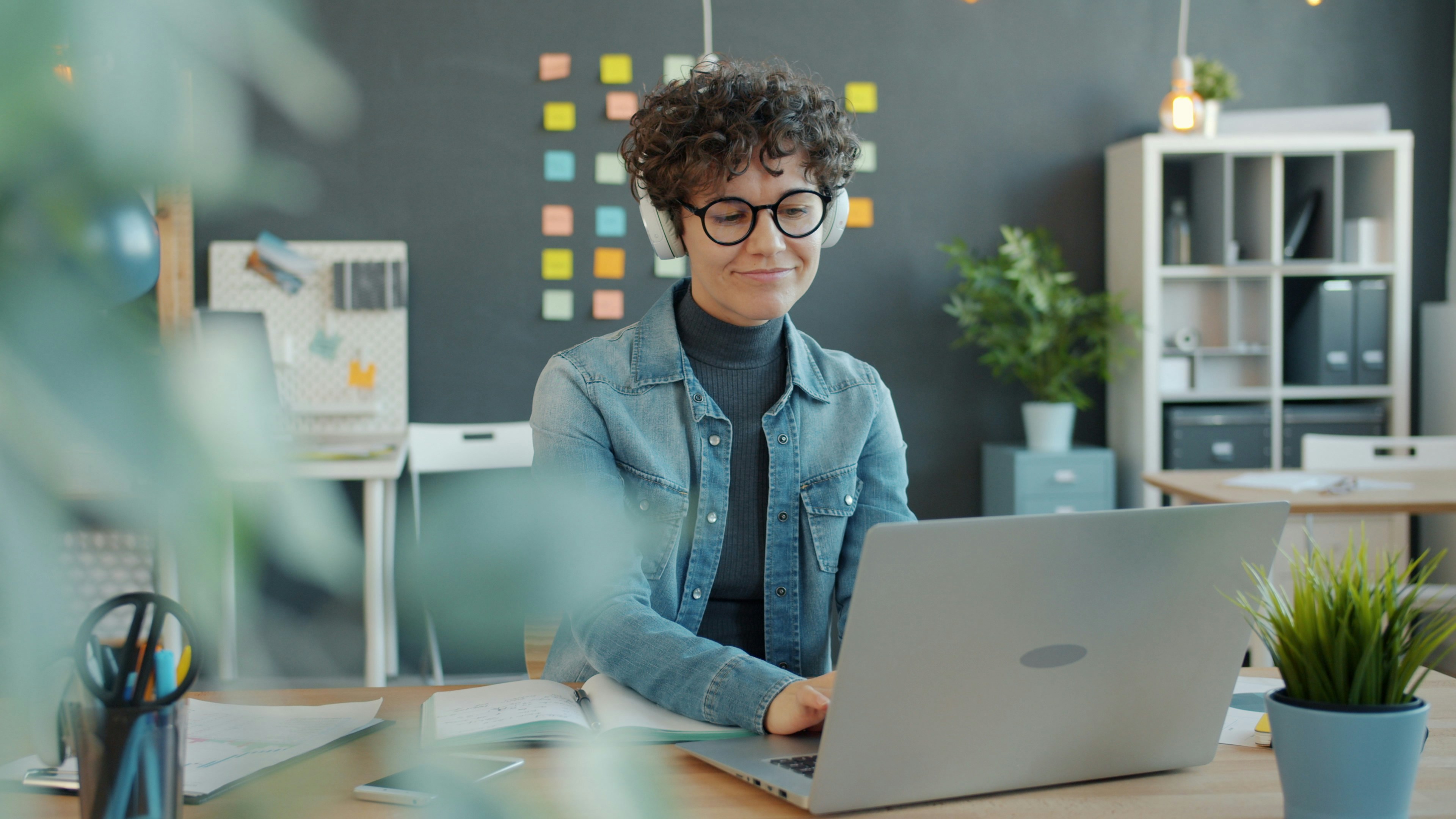 Woman working with laptop in office