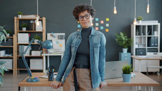 Woman smiling in a modern office setting