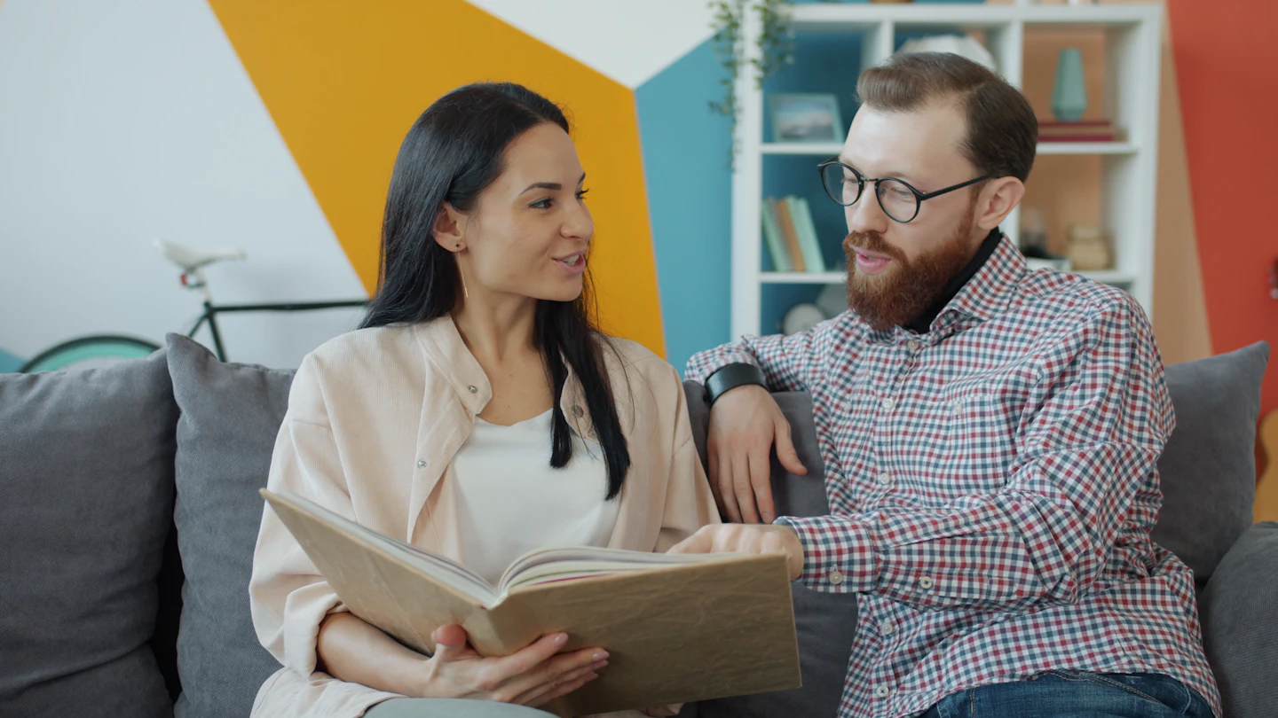 Couple reviewing policy documents