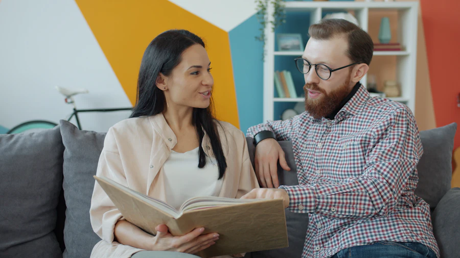 A couple looking through a photo album together