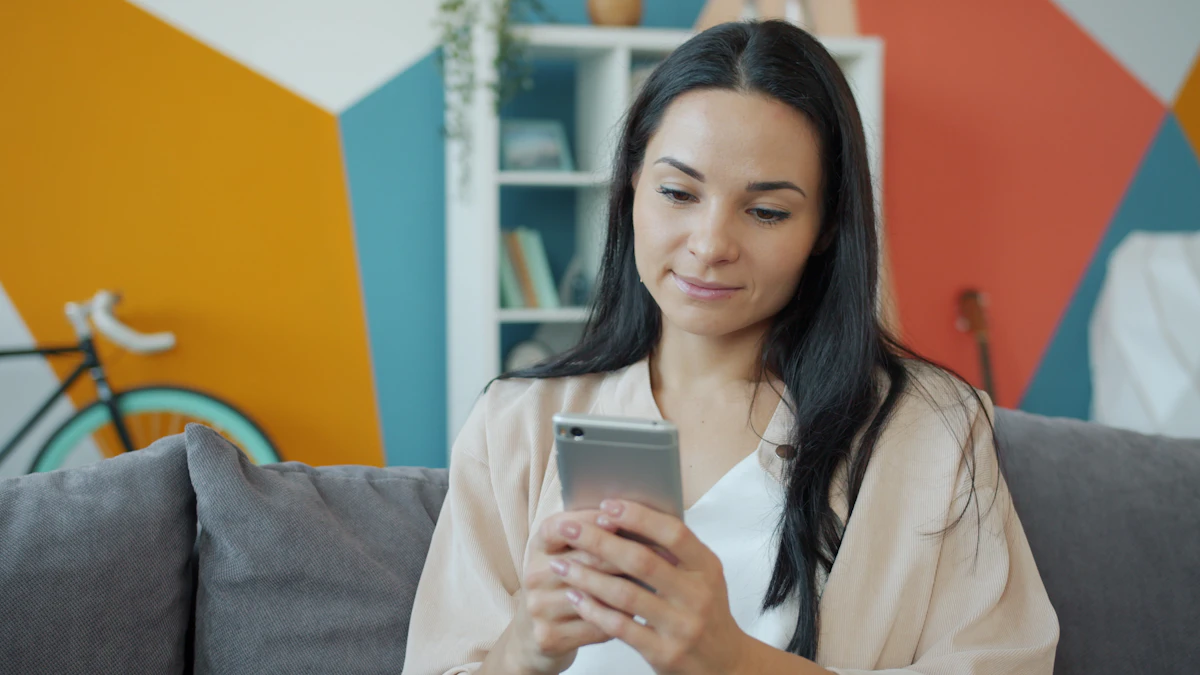 A tenant checking her Afiewura application status on her phone at home