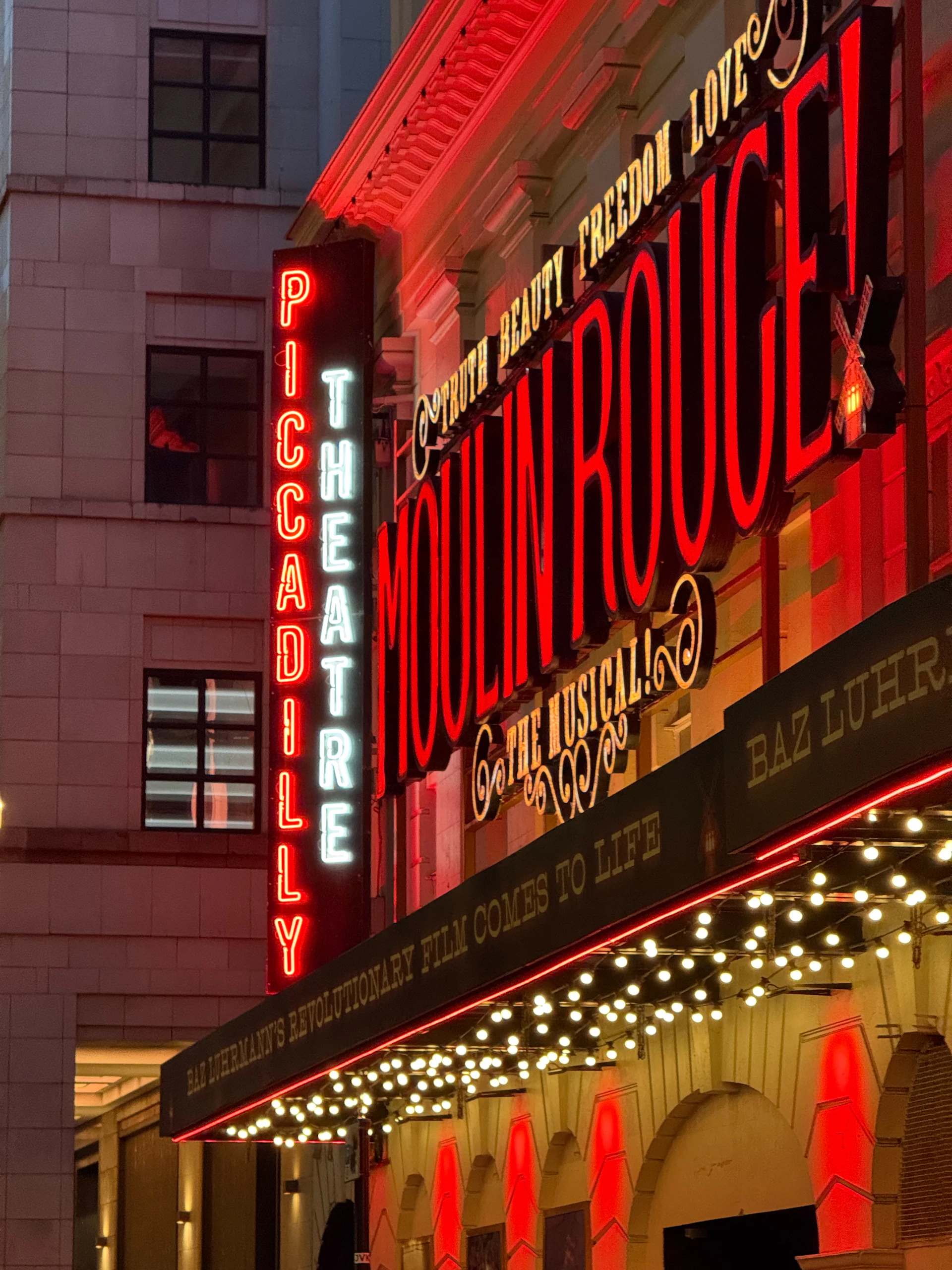 Moulin rouge musical theatre marquee at night