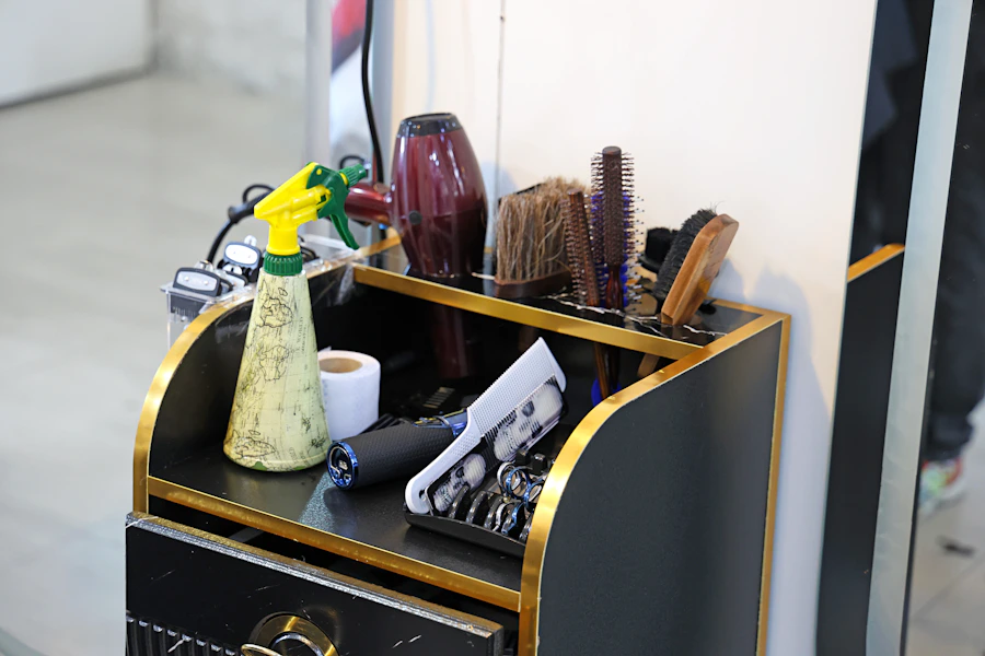 Hairdressing combs and a spray bottle arranged on a salon styling trolley